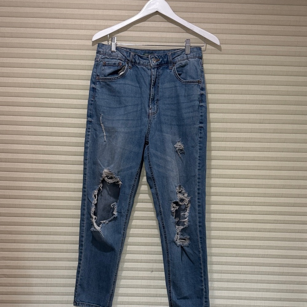 Distressed Blue Jeans
